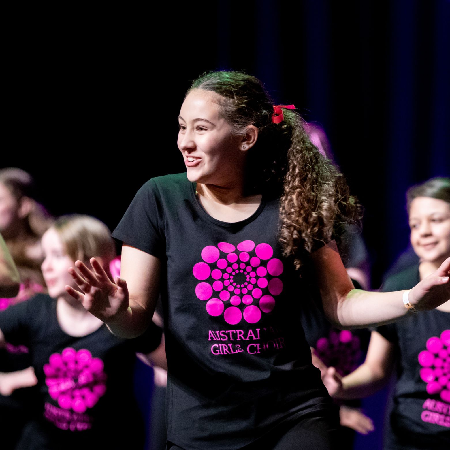 AGC dancing in black AGC logo t-shirt