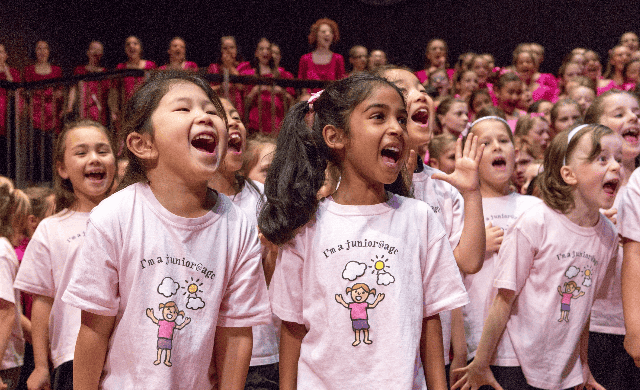 girls in pink performing